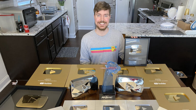 MrBeast with his YouTube plaques