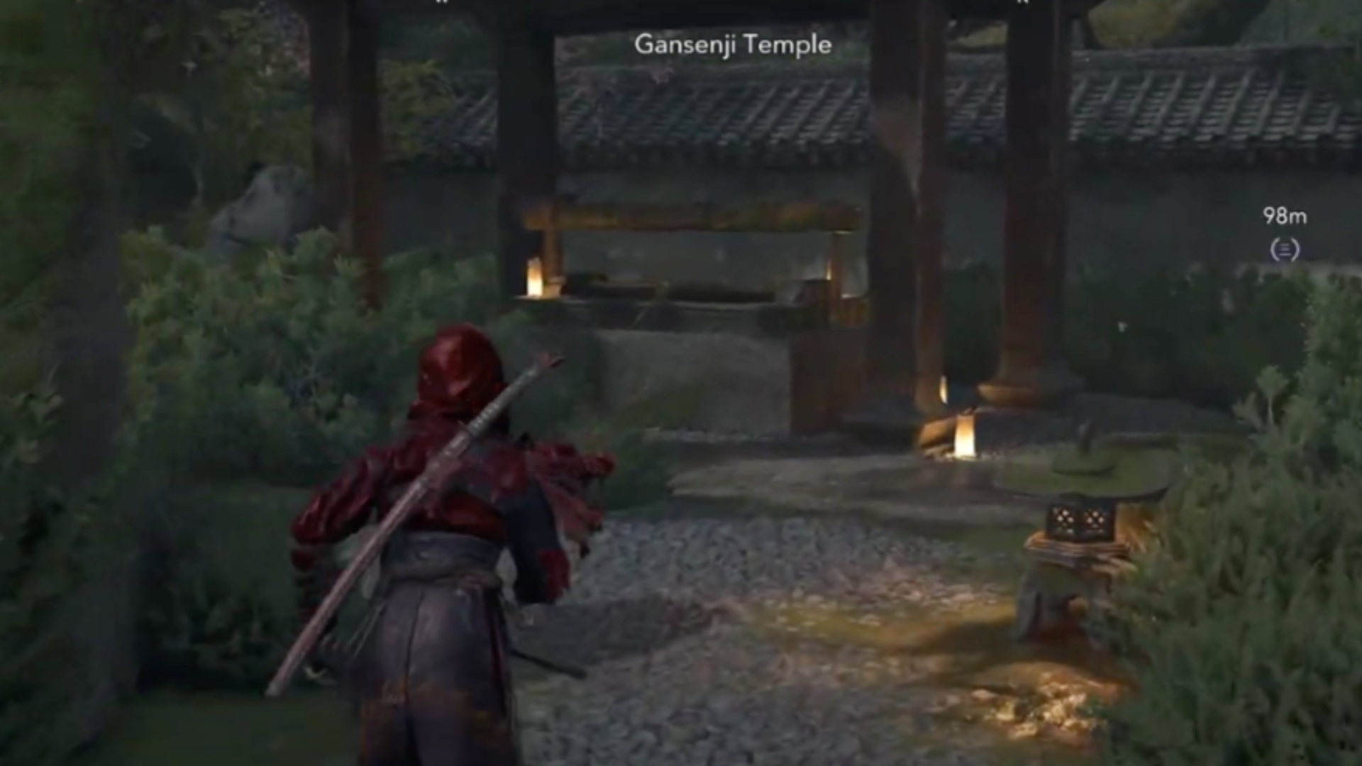 The first lost page is behind a large rock in the garden (Image via Ubisoft)
