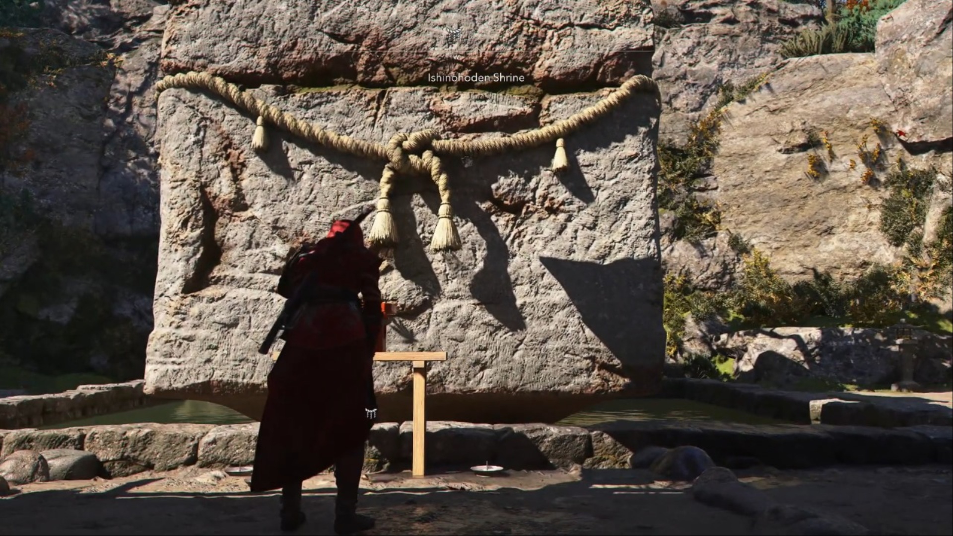 Naoe praying at a shrine (Image via Ubisoft, YouTube@Wow Quests)