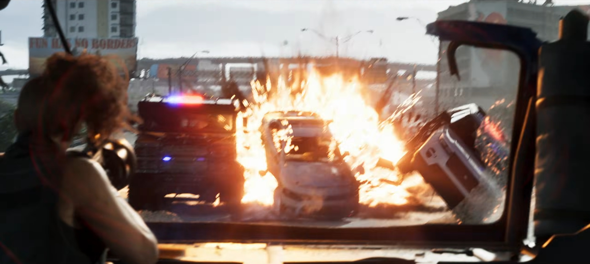 Lucia fires a grenade launcher at pursuing cops