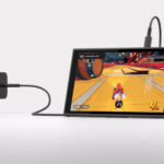 Picture of Nintendo Switch 2 connected to a wall adapter