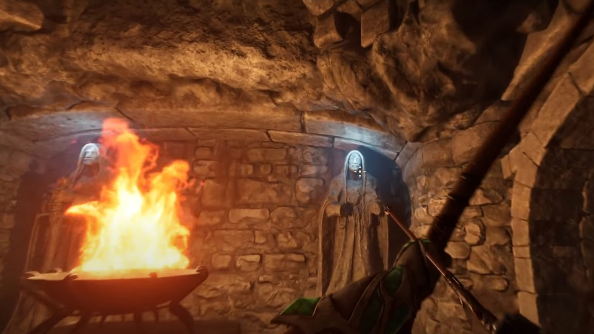 Open the gates by firing at the blue gems on the statue heads