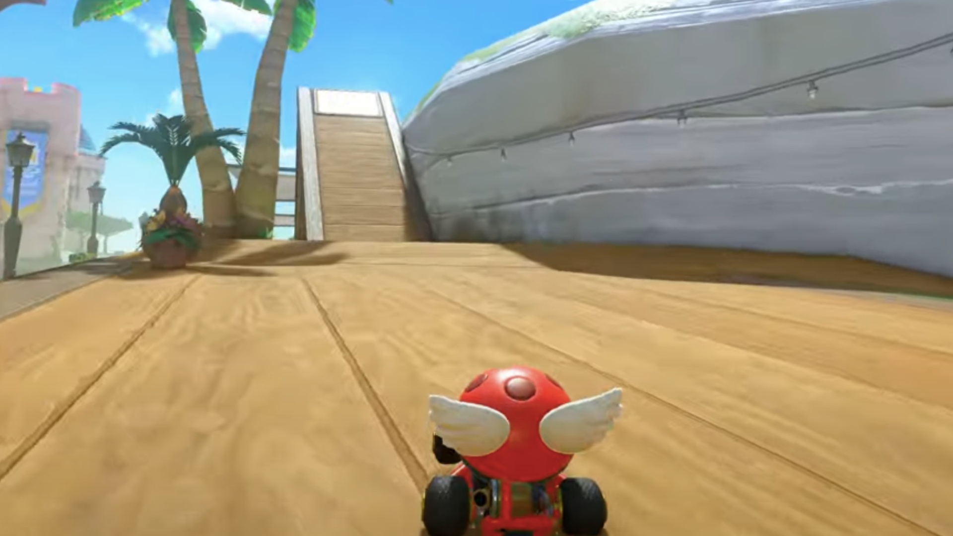 Climb up the wooden ramp for the first Peach Beach question mark panel (Image via Nintendo | Nintendozer/YouTube)