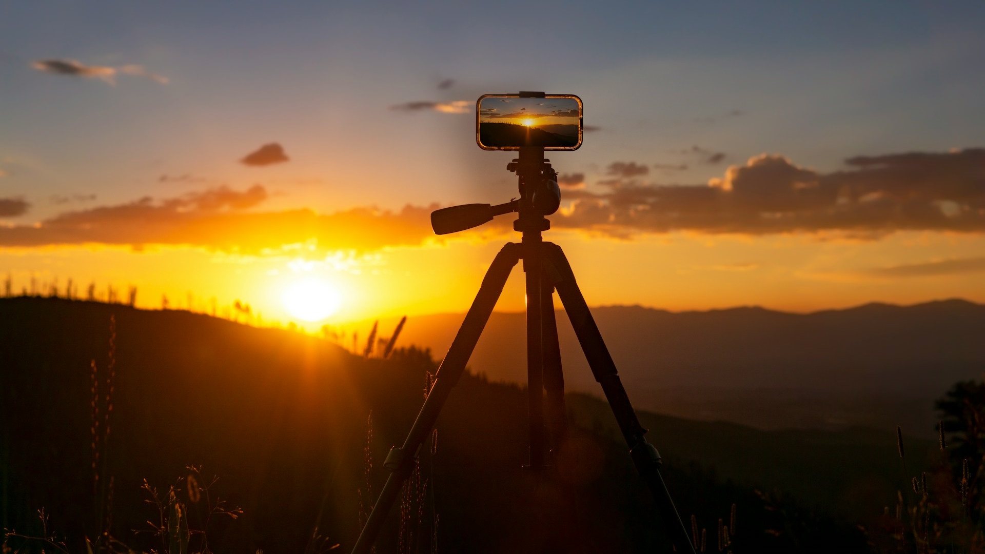 Picture of camera on Tripod overlooking the sunset