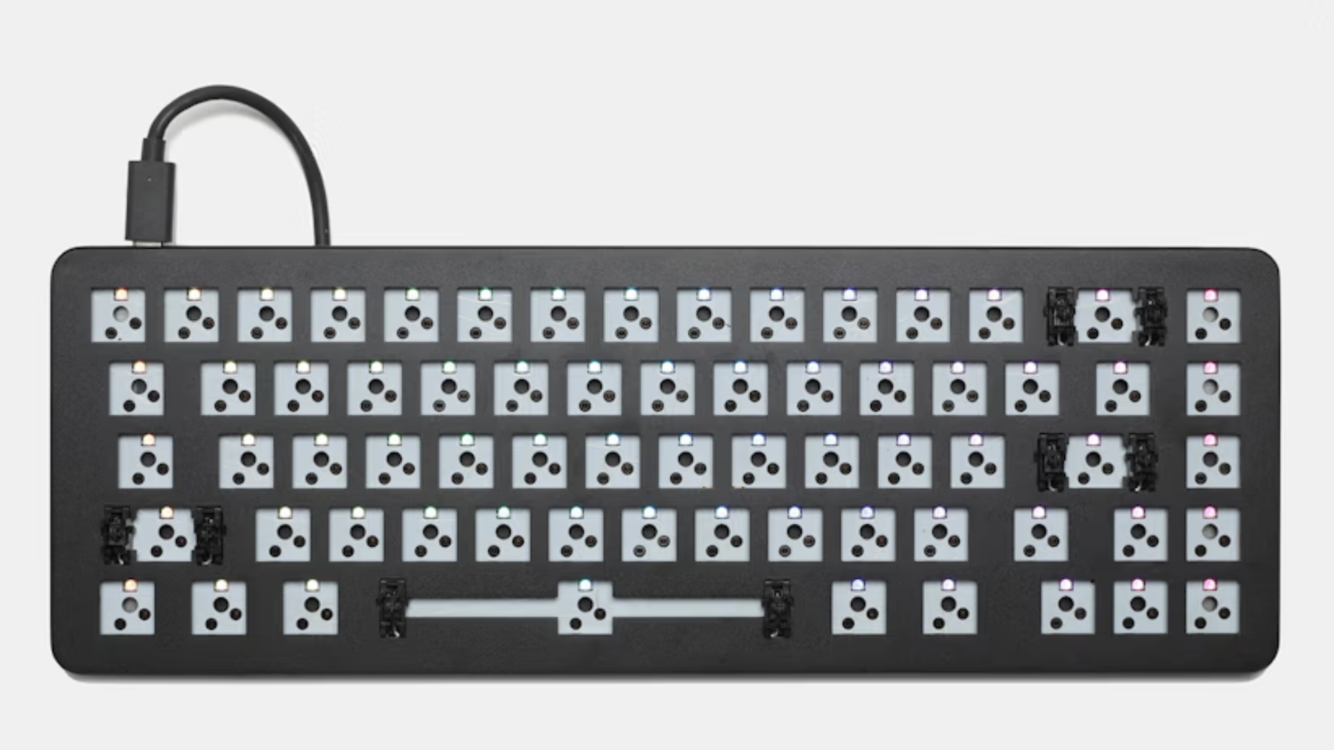 The Drop ALT’s hot-swappable layout and QMK support offer deep customizability within a compact tenkeyless form factor.