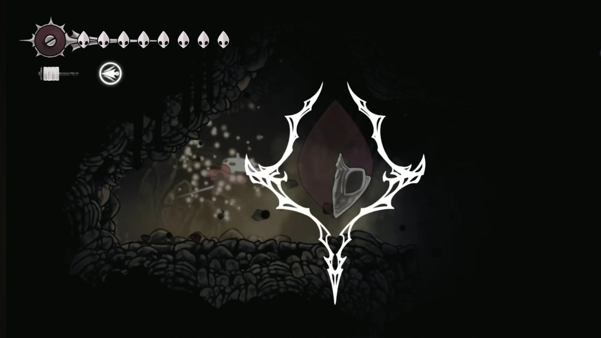 Mask Shard 15 from Act 3 of Blasted Steps (Image via Team Cherry/ @ Lunar Gaming on YouTube)
