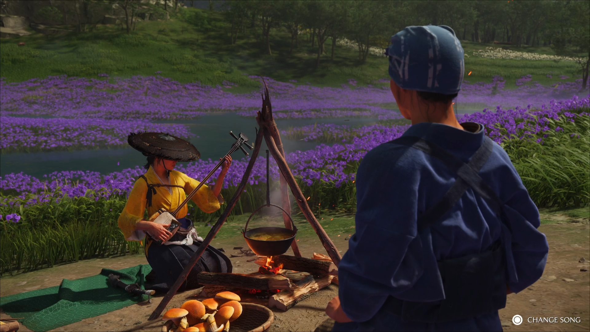 Playing the Shamisen at camp [Source: Sucker Punch]