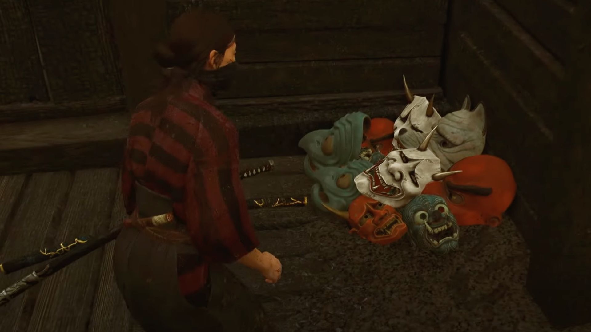 A stack of masks in the corner.