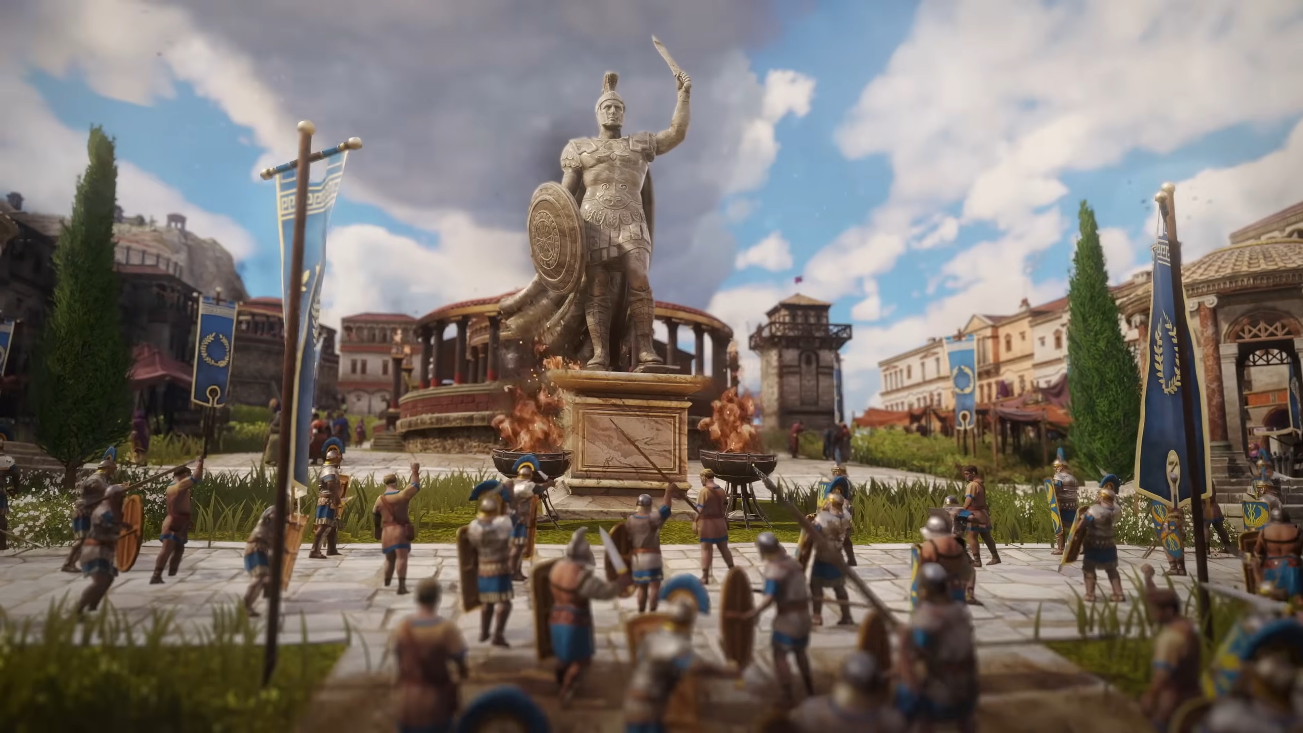 Picture describes a gathering in front of a large statue in Anno 117