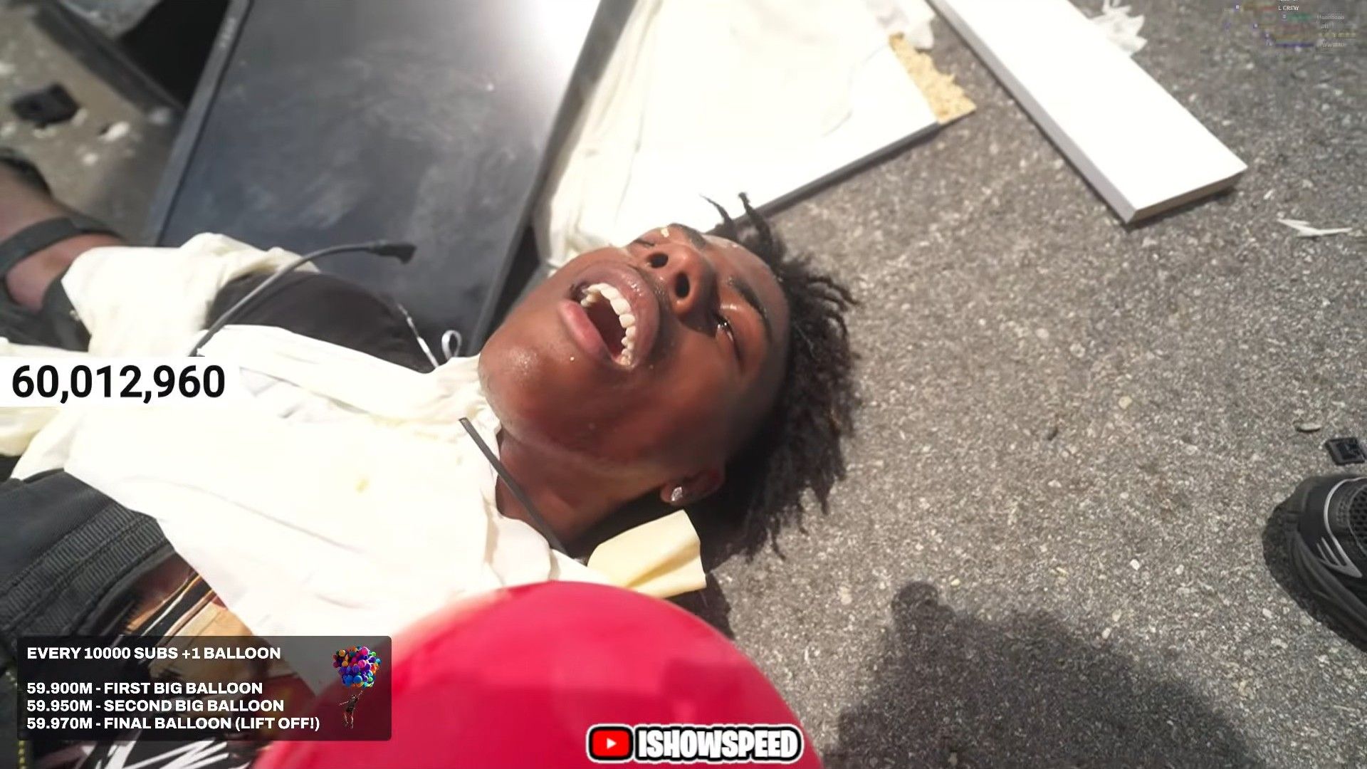 The streamer lying on the ground after his crash (Image via YouTube/IShowSpeed)