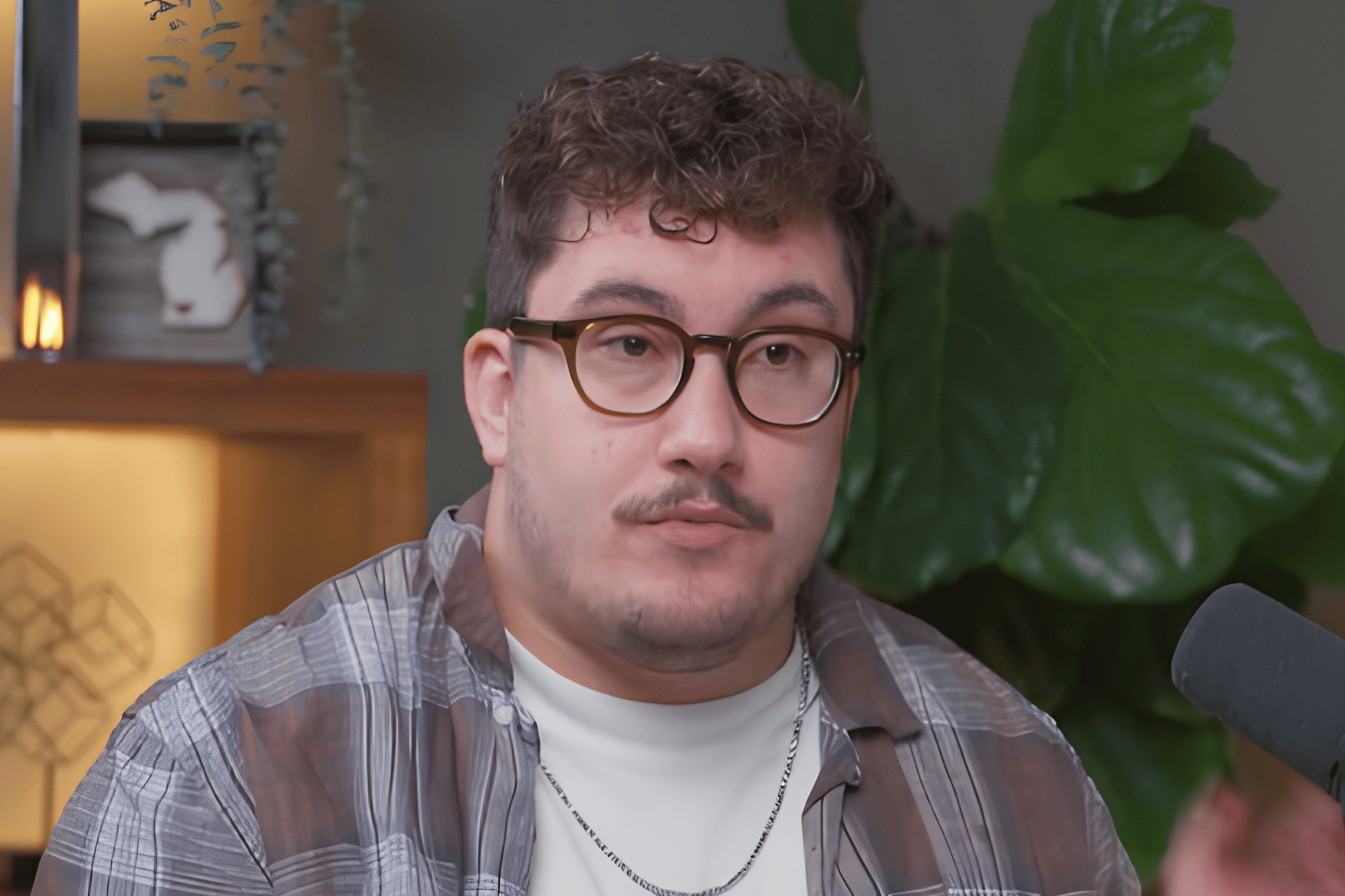 Caleb Hammer reacts as a journalist brings receipts showing capitalism as a force for good.