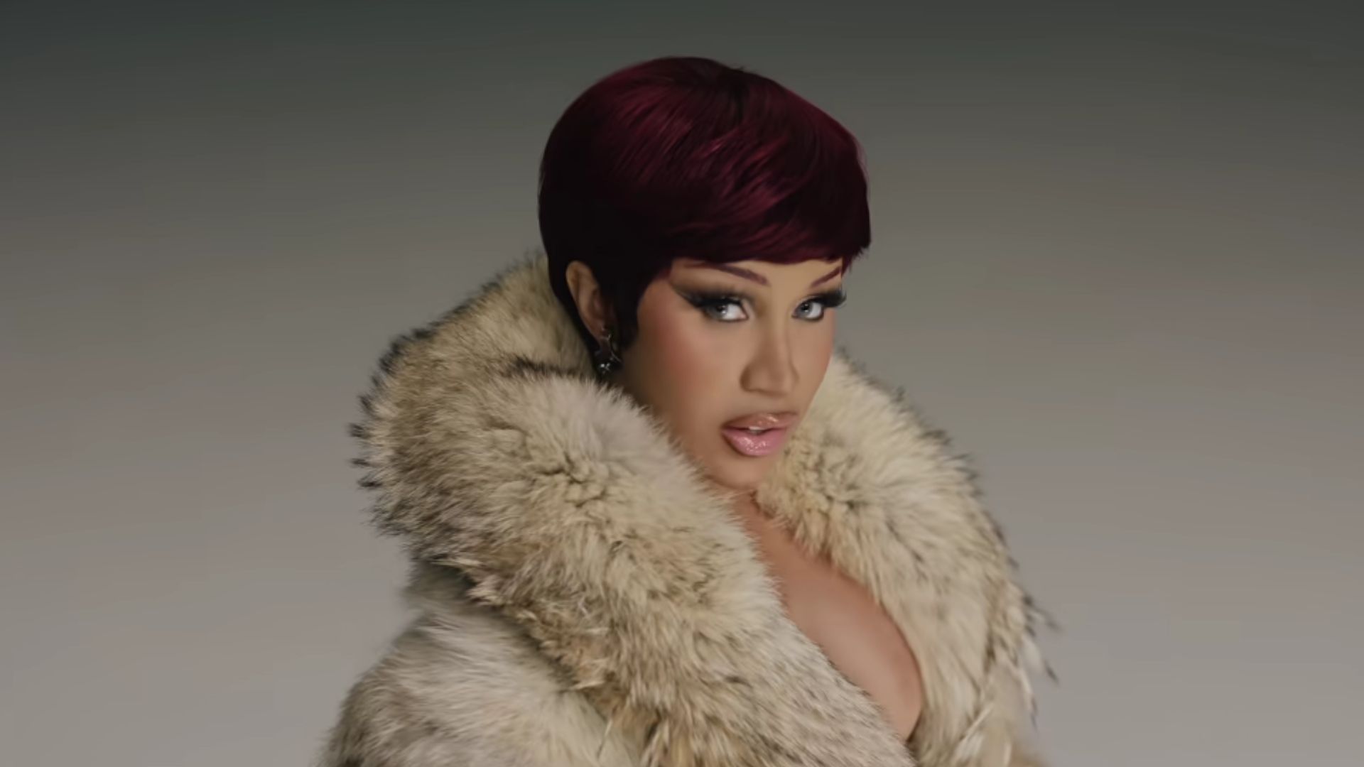Cardi B smacks fan's hands after they inappropriately touch her (Image via YouTube/@cardib)