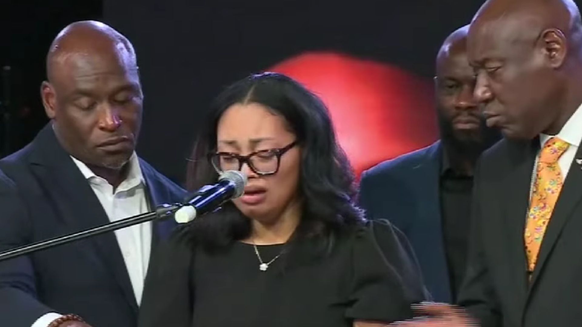 Nolan Wells' mother tears up at the press conference (Image via YouTube/@AssociatedPress)