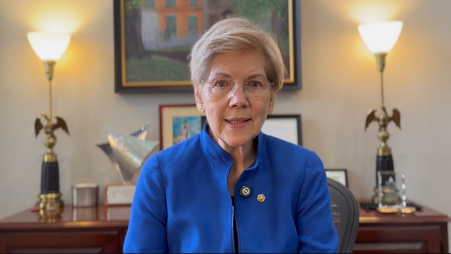 The senator believes Trump is the obstacle to lowering costs (Image via YouTube/Senator Elizabeth Warren)